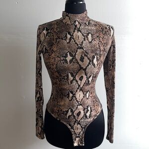 3/$15 Women’s Large leopard print bodysuit